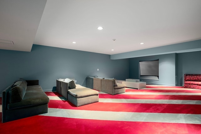 cinema room featuring light carpet