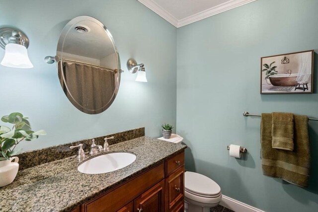 full bath featuring toilet, visible vents, ornamental molding, and vanity