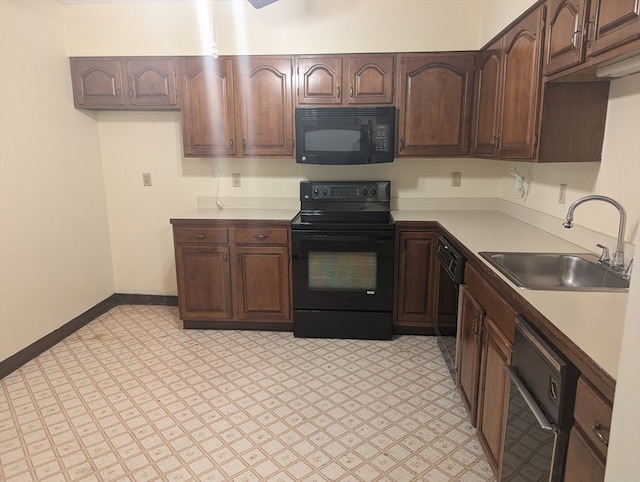 kitchen featuring sink and black appliances