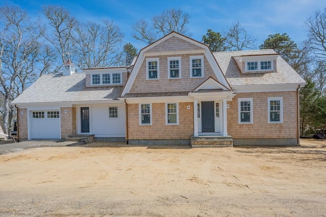 287 Cedar St, Chatham, MA 02633 - shingle-style home featuring an attached garage and a chimney