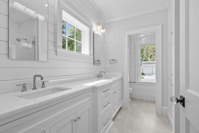 287 Cedar St, Chatham, MA 02633 - full bathroom with double vanity, toilet, crown molding, a shower, and marble finish flooring