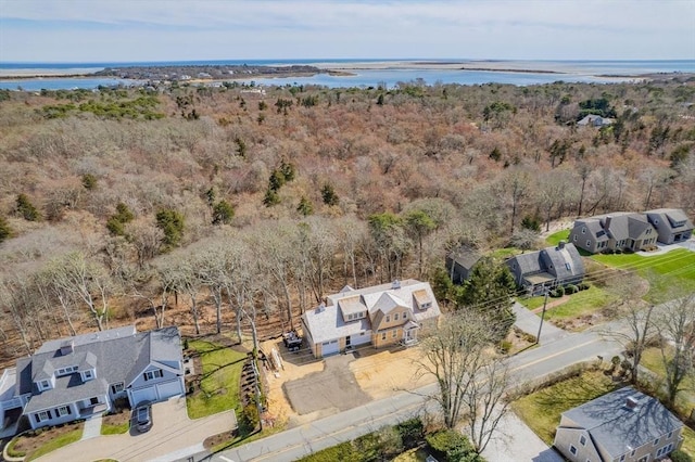 287 Cedar St, Chatham, MA 02633 - aerial view of residential area with a nearby body of water and a heavily wooded area