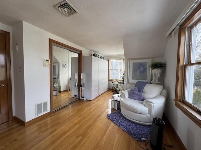 living area featuring light hardwood / wood-style flooring