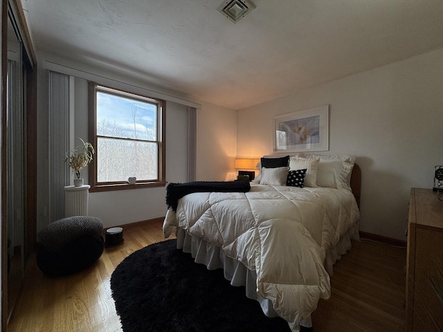 bedroom featuring light hardwood / wood-style flooring