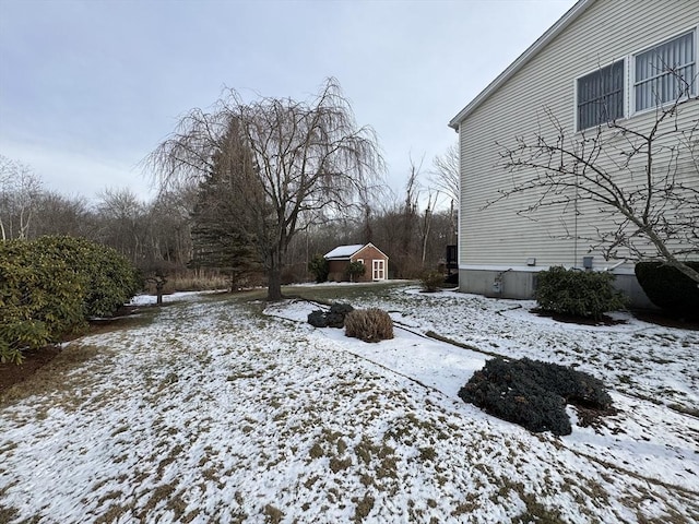 view of yard covered in snow