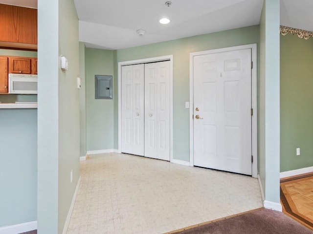 218 Reservoir St Unit 211, Holden, MA 01520 - entryway featuring electric panel, baseboards, and recessed lighting