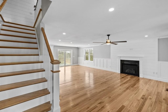 312 Old Westport, Dartmouth, MA 02747 - unfurnished living room featuring ceiling fan, light wood-style flooring, recessed lighting, stairs, and a fireplace