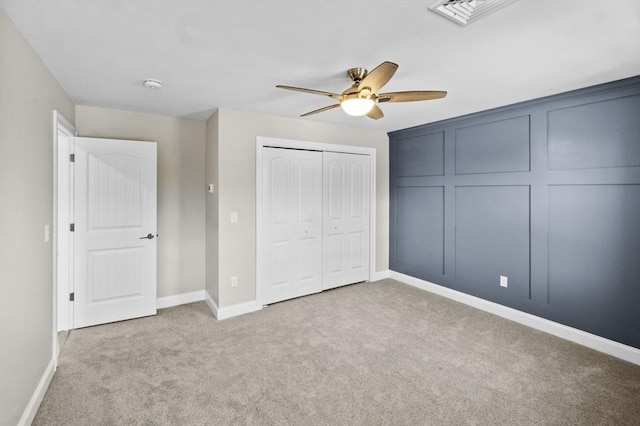312 Old Westport, Dartmouth, MA 02747 - unfurnished bedroom with carpet, baseboards, a ceiling fan, and a closet