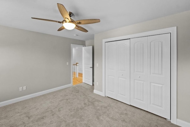 312 Old Westport, Dartmouth, MA 02747 - unfurnished bedroom featuring carpet, baseboards, a closet, and a ceiling fan