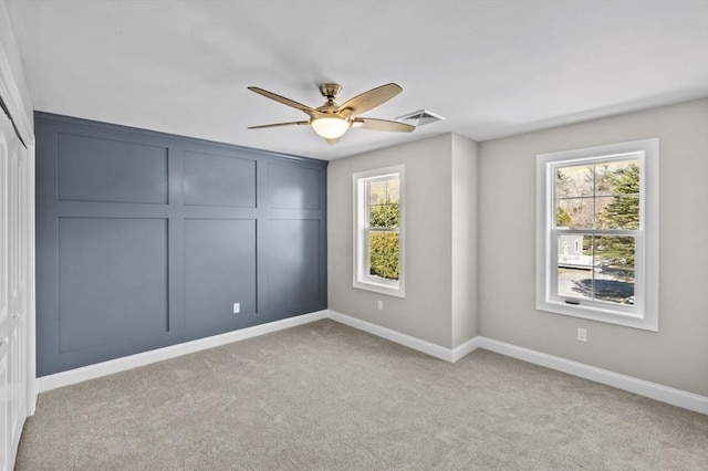 312 Old Westport, Dartmouth, MA 02747 - unfurnished bedroom featuring light colored carpet, baseboards, a closet, and ceiling fan