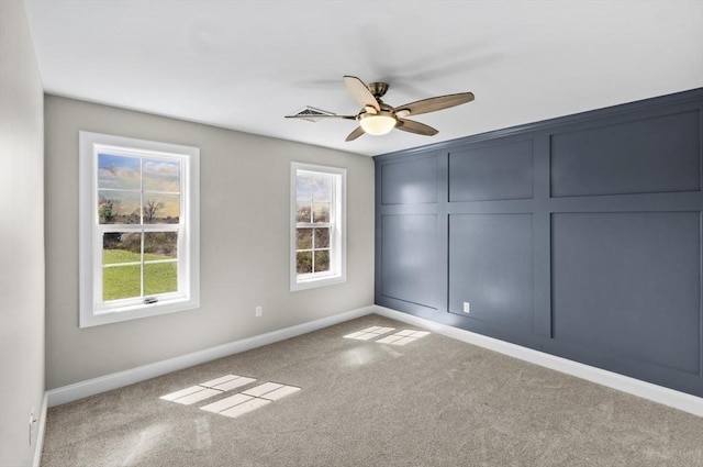 312 Old Westport, Dartmouth, MA 02747 - unfurnished bedroom with carpet flooring, baseboards, and ceiling fan
