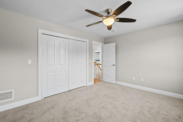 312 Old Westport, Dartmouth, MA 02747 - unfurnished bedroom with a closet, carpet floors, baseboards, and a ceiling fan