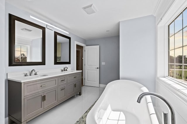 312 Old Westport, Dartmouth, MA 02747 - full bathroom with a soaking tub, double vanity, and marble finish floors