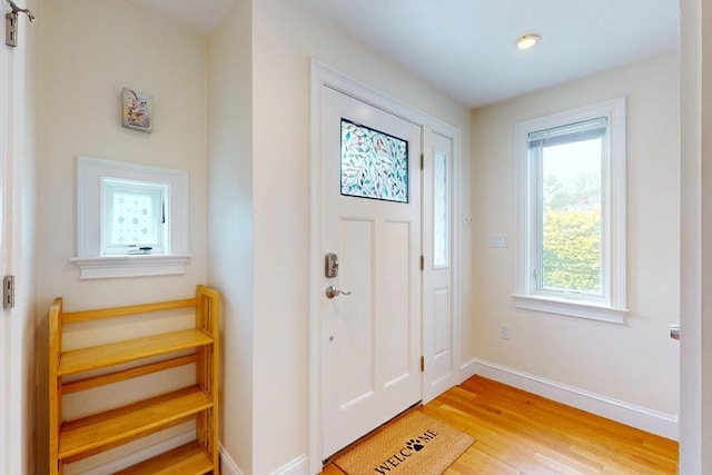 10 Bradbury St Unit 10, Boston, MA 02134 - foyer featuring light wood-style floors and baseboards