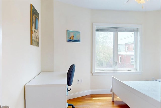 10 Bradbury St Unit 10, Boston, MA 02134 - bedroom featuring light wood-style floors, baseboards, and a desk