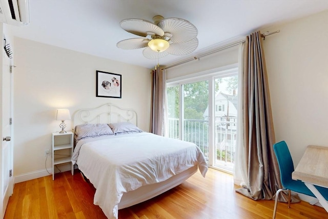 10 Bradbury St Unit 10, Boston, MA 02134 - bedroom featuring access to exterior, light wood-type flooring, baseboards, and a ceiling fan