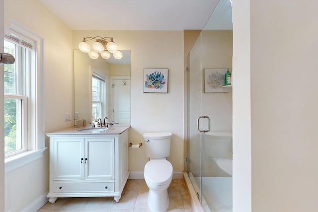 10 Bradbury St Unit 10, Boston, MA 02134 - bathroom featuring toilet, vanity, a stall shower, baseboards, and tile patterned floors