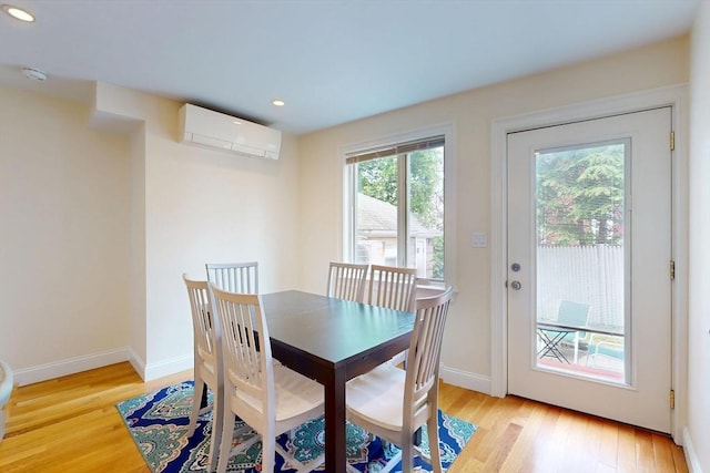 10 Bradbury St Unit 10, Boston, MA 02134 - dining area featuring a wall mounted AC, light wood finished floors, recessed lighting, and baseboards