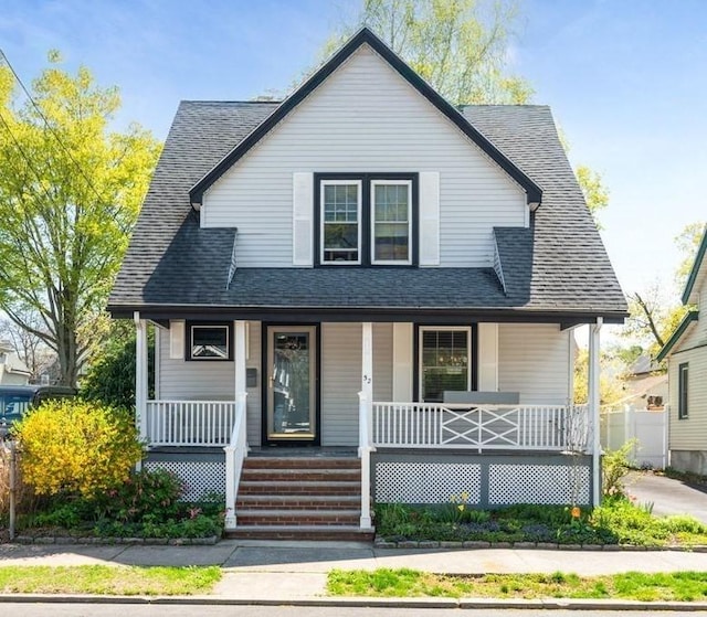 52 Locust St, Lynn, MA 01904 - bungalow-style home featuring a shingled roof and covered porch