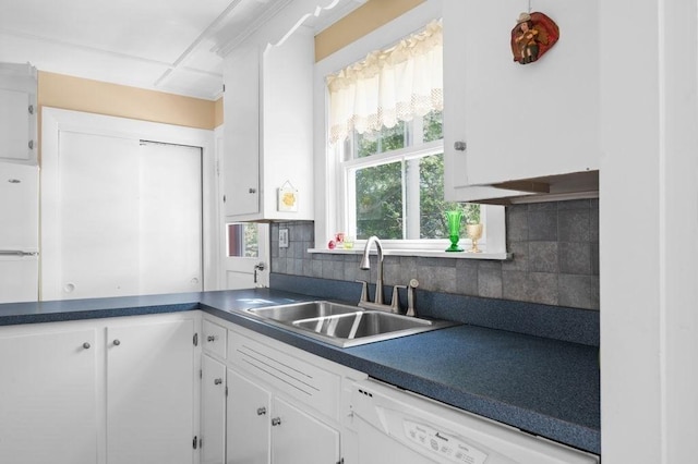 52 Locust St, Lynn, MA 01904 - kitchen featuring white cabinets, dark countertops, a sink, white appliances, and decorative backsplash