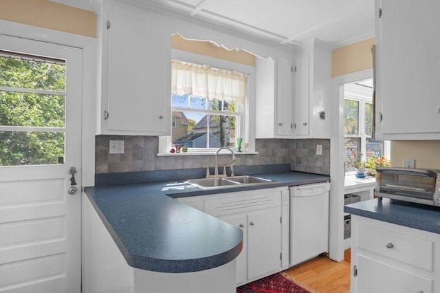 52 Locust St, Lynn, MA 01904 - kitchen with white cabinets, dark countertops, a sink, and dishwasher