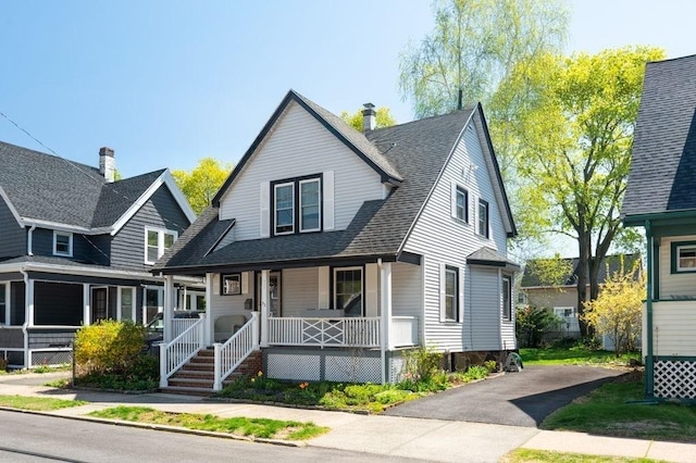 52 Locust St, Lynn, MA 01904 - view of front of property featuring roof with shingles and covered porch