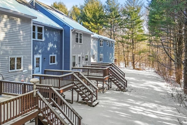 view of snow covered deck