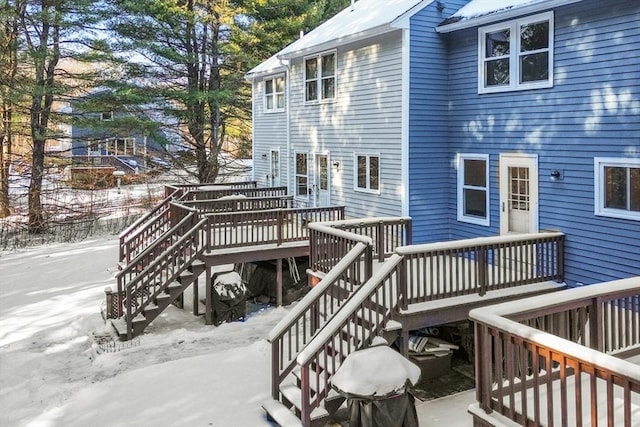 view of snow covered deck