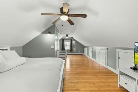 1029 Joyce St, New Bedford, MA 02745 - bedroom with wood finished floors, lofted ceiling, baseboards, and a ceiling fan