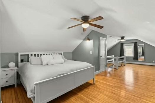 1029 Joyce St, New Bedford, MA 02745 - bedroom with wood finished floors, vaulted ceiling, and ceiling fan