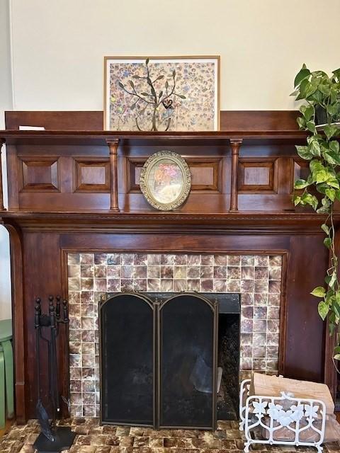 room details with a tile fireplace
