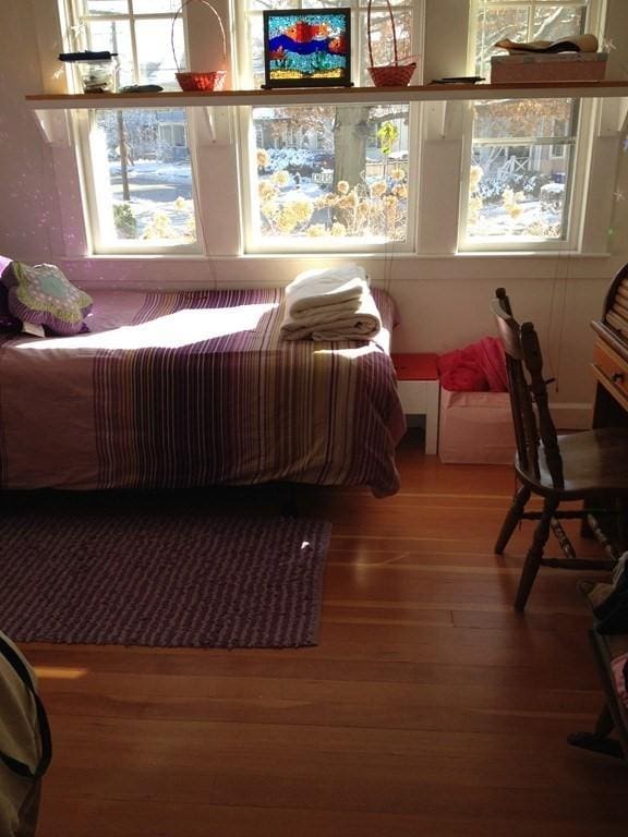 bedroom with wood finished floors