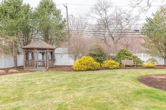 view of yard with a gazebo and fence
