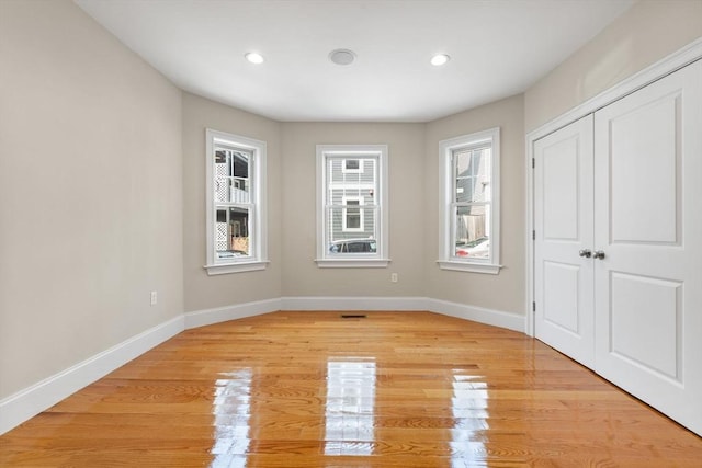 20 Winfield St Unit 1, Boston, MA 02127 - unfurnished bedroom featuring light wood-type flooring, recessed lighting, and a closet