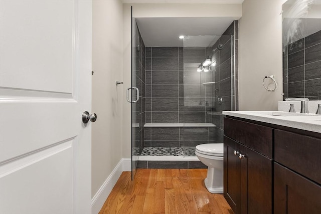 20 Winfield St Unit 1, Boston, MA 02127 - full bathroom featuring a stall shower, wood finished floors, and vanity
