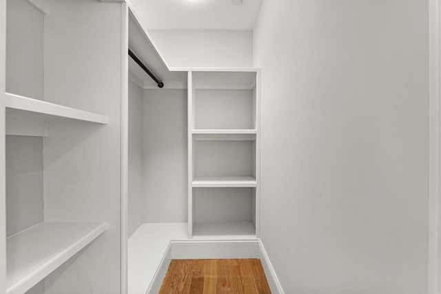 20 Winfield St Unit 1, Boston, MA 02127 - walk in closet featuring wood finished floors