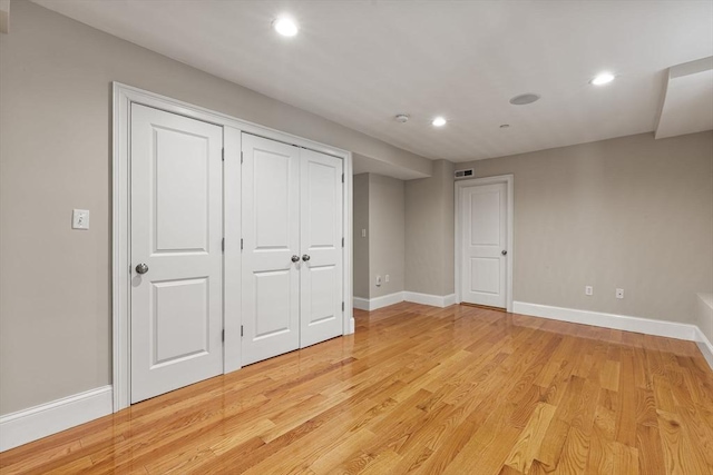 20 Winfield St Unit 1, Boston, MA 02127 - unfurnished bedroom featuring recessed lighting, light wood-style flooring, and a closet