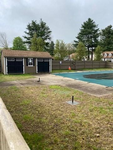 19 Camelot Ct Unit 19, Stoughton, MA 02072 - view of community featuring a swimming pool and an outbuilding