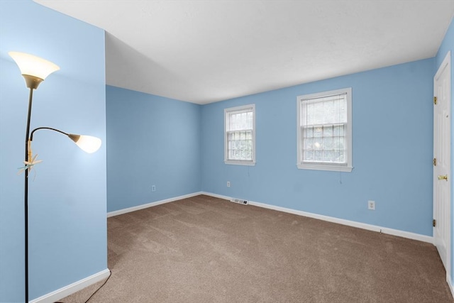 19 Camelot Ct Unit 19, Stoughton, MA 02072 - carpeted empty room featuring baseboards