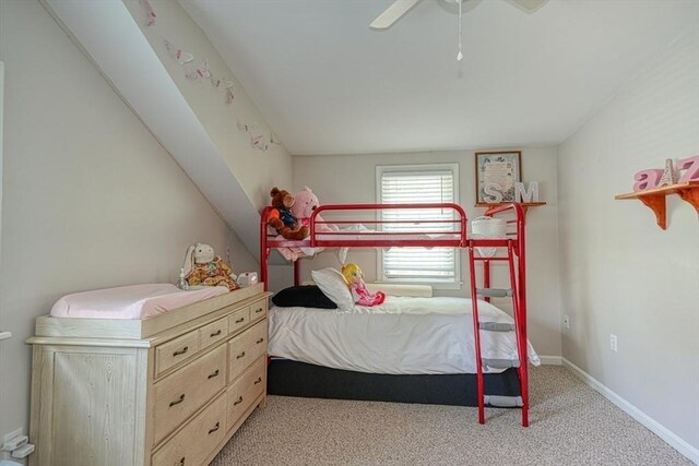 bedroom featuring carpet, a ceiling fan, and baseboards
