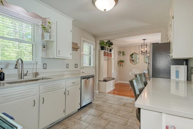 kitchen featuring a sink, appliances with stainless steel finishes, white cabinetry, and open shelves