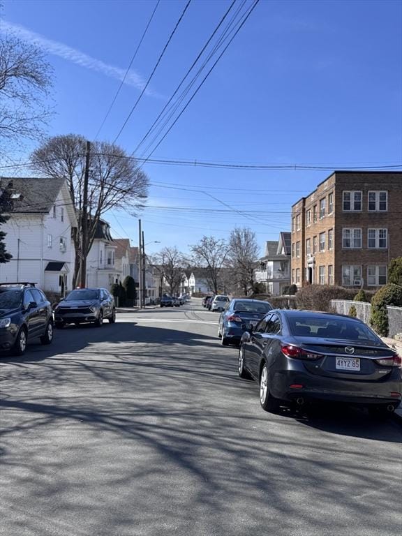 91 Tudor St, Chelsea, MA 02150 - view of asphalt street featuring street lights and a residential view