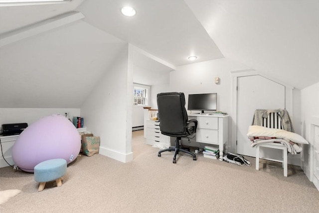 office space featuring carpet, lofted ceiling, baseboards, and recessed lighting