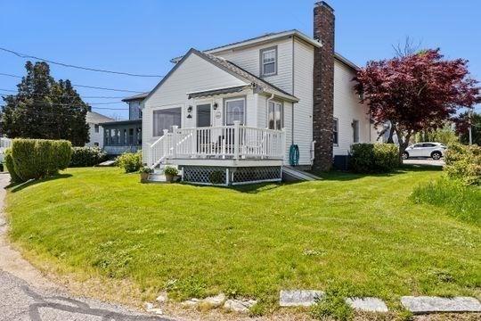 45 Rocky Nook Ave, Kingston, MA 02364 - view of front of property featuring a chimney and a front yard