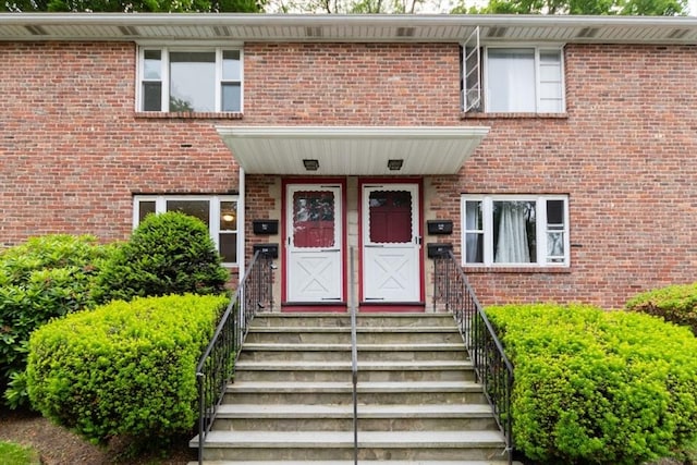 58 Aldrich Rd Unit A, Watertown, MA 02472 - doorway to property with brick siding