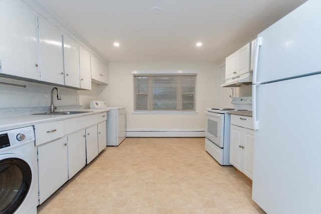 58 Aldrich Rd Unit A, Watertown, MA 02472 - kitchen featuring white appliances, baseboard heating, under cabinet range hood, white cabinetry, and independent washer and dryer