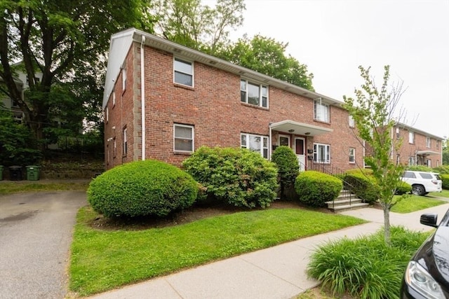 58 Aldrich Rd Unit A, Watertown, MA 02472 - townhome / multi-family property with brick siding