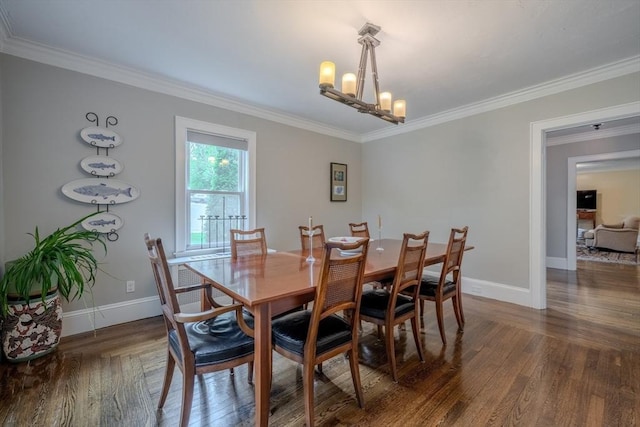 7 Argyle St, Worcester, MA 01609 - dining space featuring baseboards, wood finished floors, ornamental molding, and a chandelier