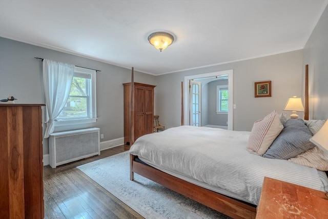 7 Argyle St, Worcester, MA 01609 - bedroom featuring radiator, wood finished floors, and baseboards