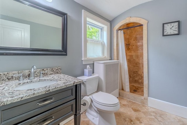 7 Argyle St, Worcester, MA 01609 - full bath with vanity, toilet, tiled shower, and baseboards